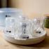 Парен стерилизатор за микровълнова фурна Tommee Tippee Micro Steri с включена ортодонтична залъгалка 0-6м